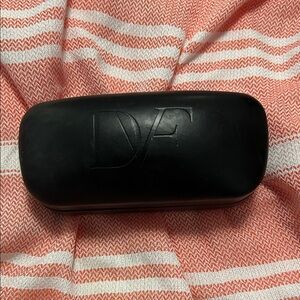 Diane Von Furstenberg hard-shell clamshell sleek black eyeglasses case